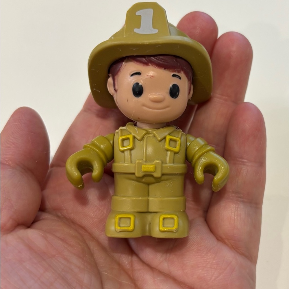 5/$10* Fisher’s Firefighter Toy Figure - Tan